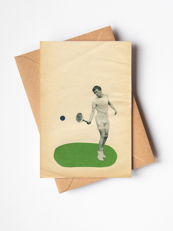 A greeting card depicting a male tennis player hitting a ball. 