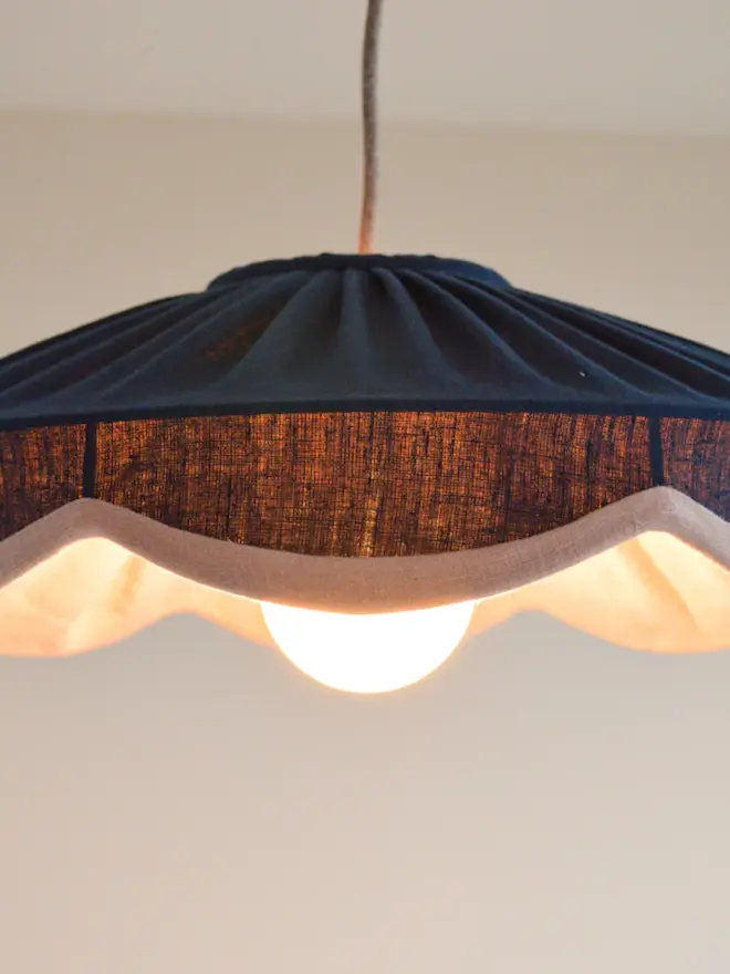 Navy & Pink Linen Scallop Lampshade lit up