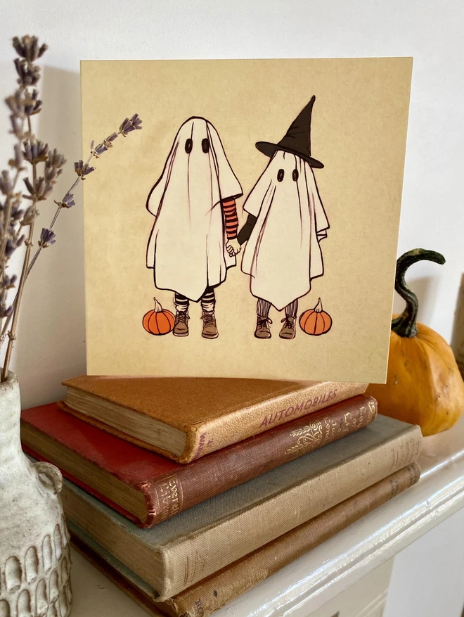 ghost greeting cards on a mantel piece