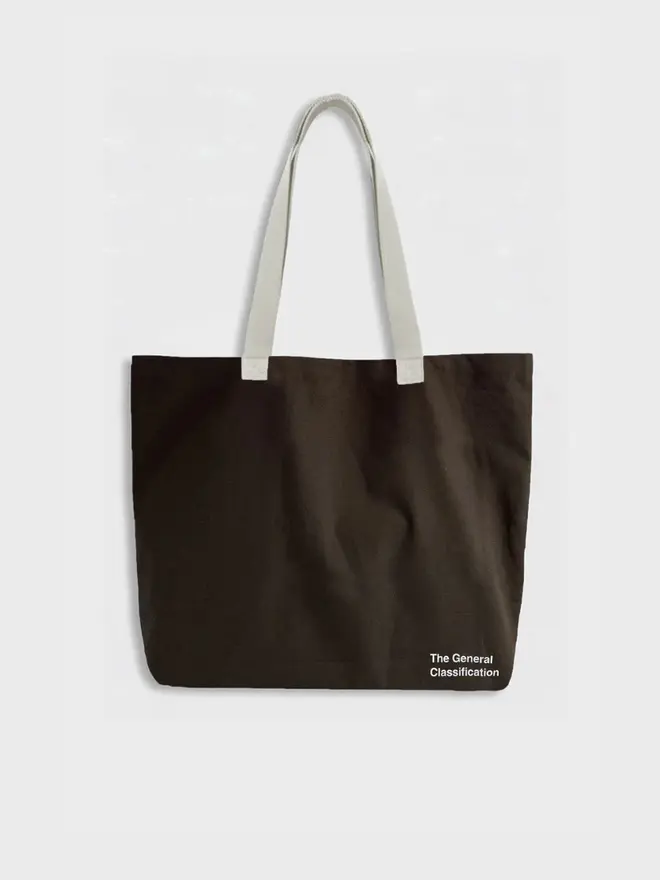 'Chaos' Tote Bag, against a grey background. 