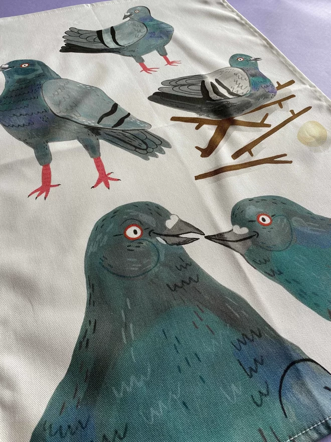Detail of Illustrated Kitchen Tea Towel with five pigeons