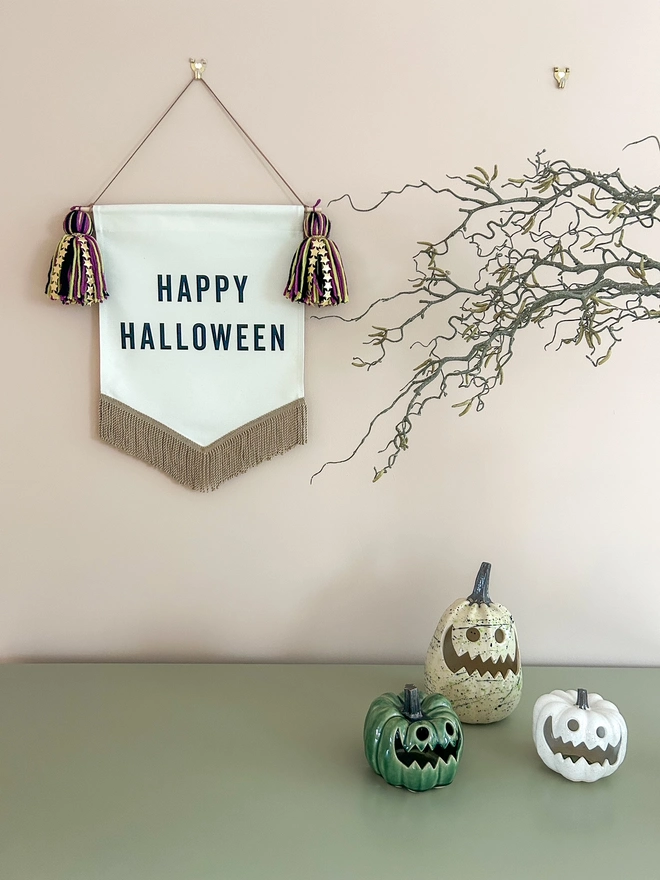 Happy Halloween Banner with a gold fringe trim 