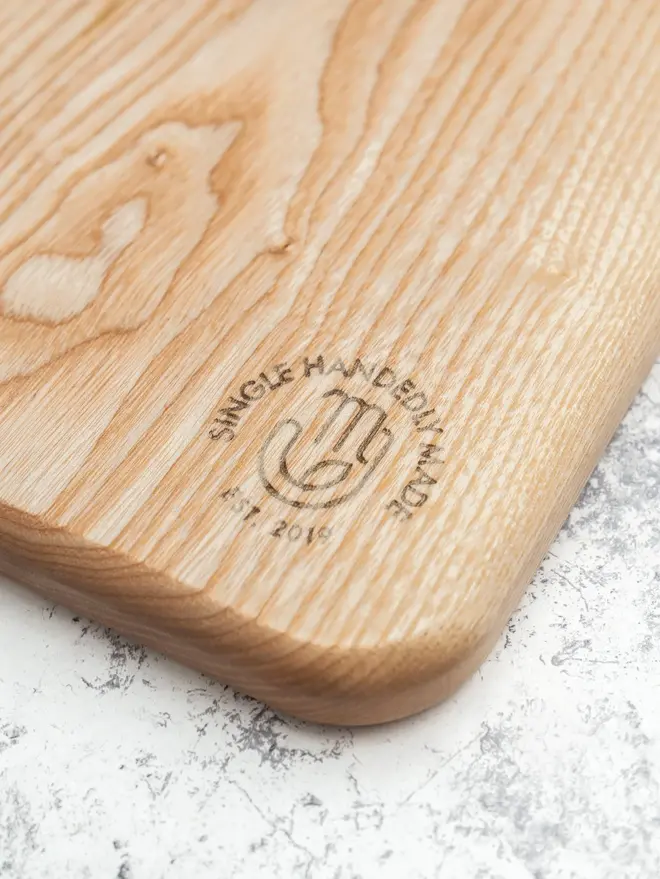 Small Serving Board, on a marble surface. 