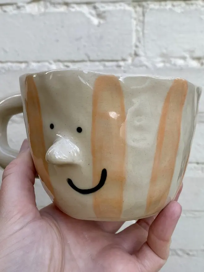 orange white stripe handmade ceramic smiley face mug