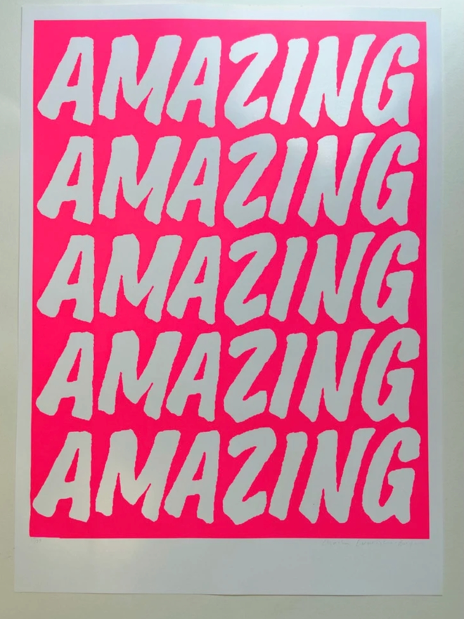 Fluoro Amazing Print. A vibrant pink background with AMAZING written five times.