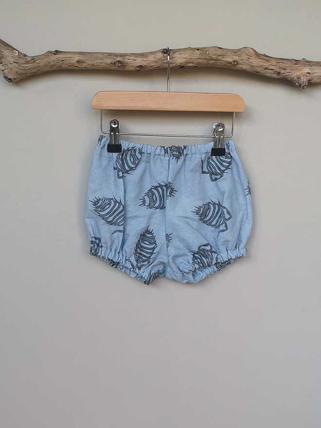 Baby Blue Cotton Linen Baby Bloomers. Elasticated waist and leg holes. Featuring a delicate charcoal grey Woodlouse print.