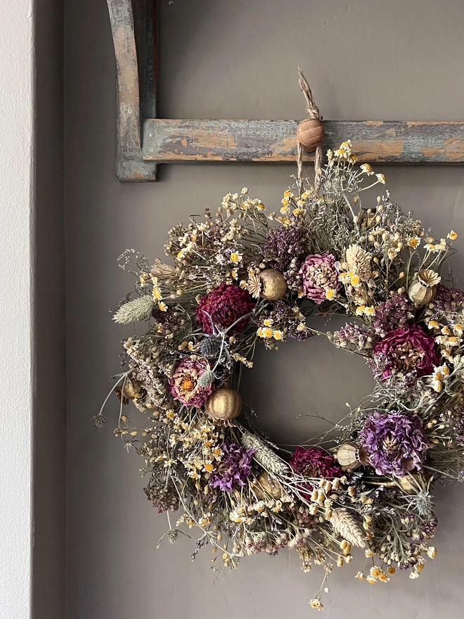 Autumnal dried flower wreath made with a range of seasonal flowers