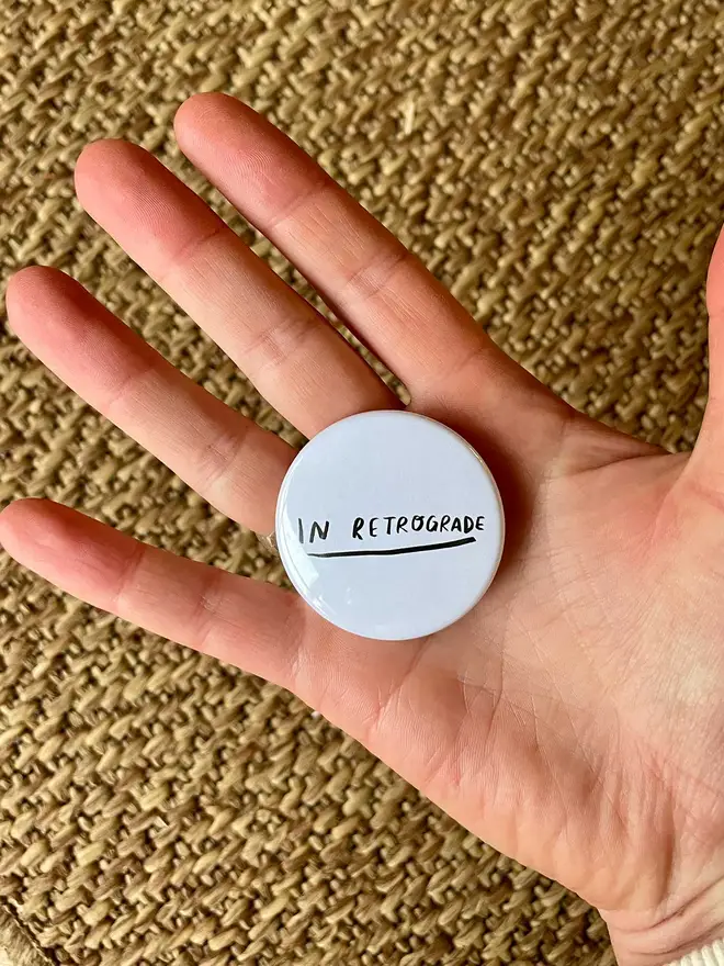 In retrograde badge