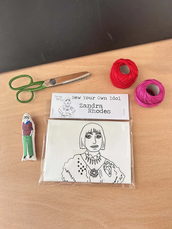 A craft kit to Sew Your Own Idol which contains a black and white fabric cushion featuring an illustration of Zandra Rhodes.