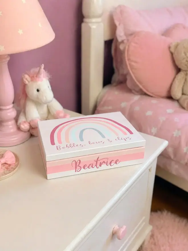 personalised rainbow kids' jewellery box. a custom wooden child's jewellery box.