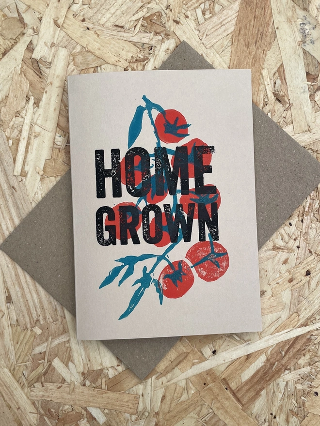 'Home Grown' Tomatoes Lino Garden Print. A display of handmade tomato-themed cards 