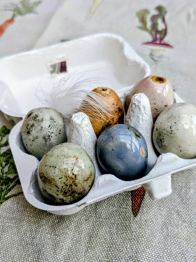 Ceramic songbird eggs