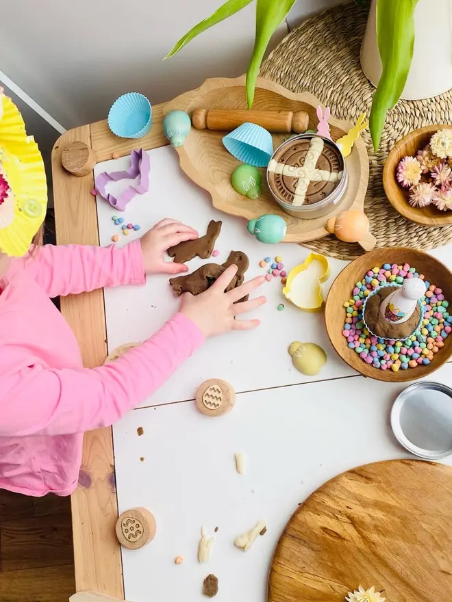 child playing with Easter play dough