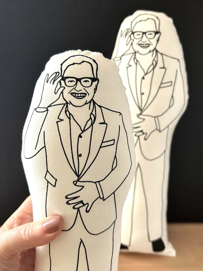 Black and white Alan Carr cushions