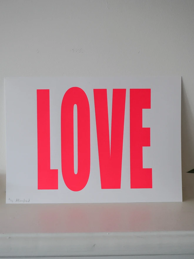 Love screen print in hot pink