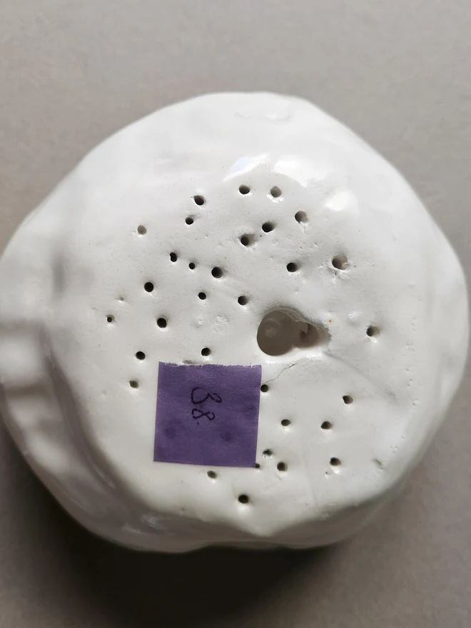white handmade ceramic rose
