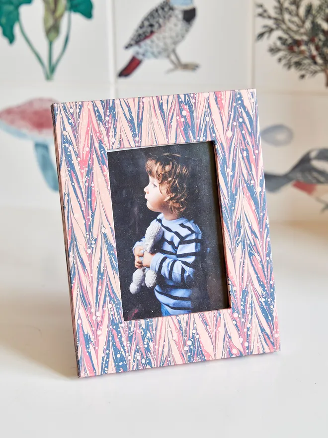 hand mrabled picture frame with photo of young child