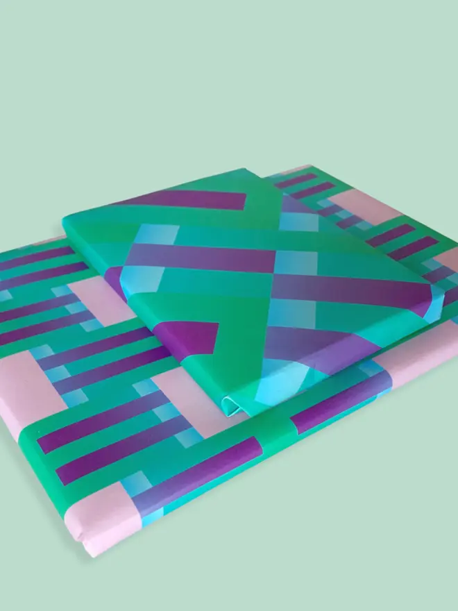 Geometric Pattern Wrapping Paper, against a green background. 