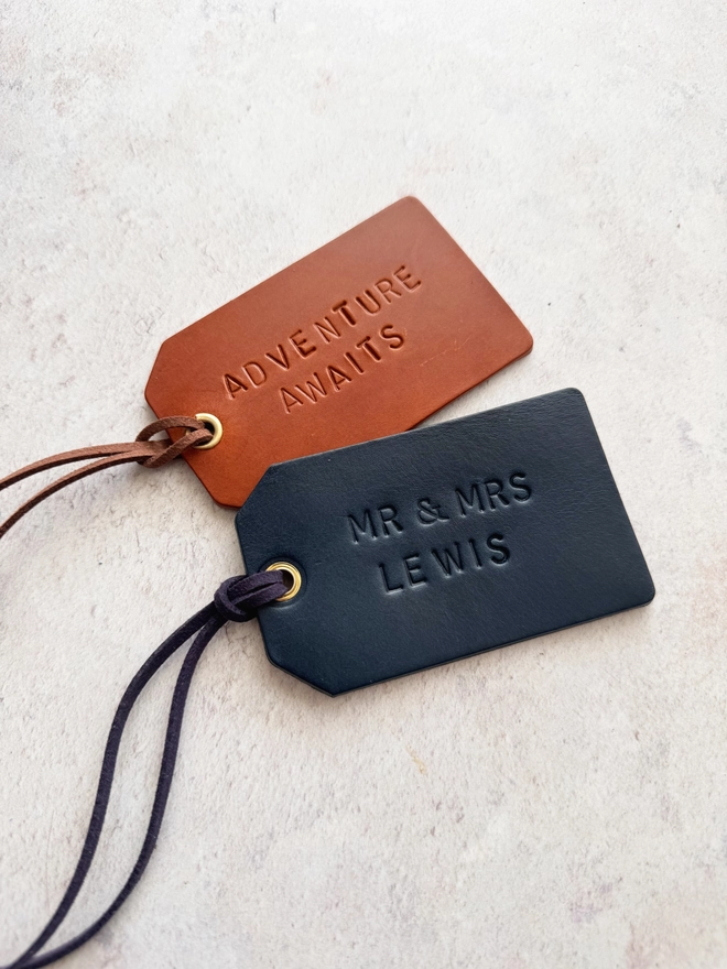 handmade leather luggage tags.