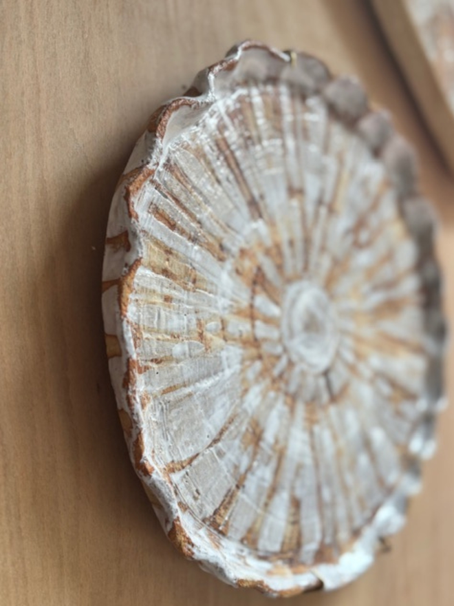 Ceramic shell plate