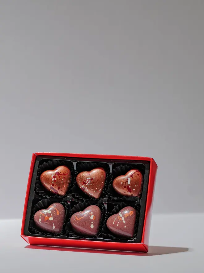 Limoncello truffles pack of 6 on a white background. 