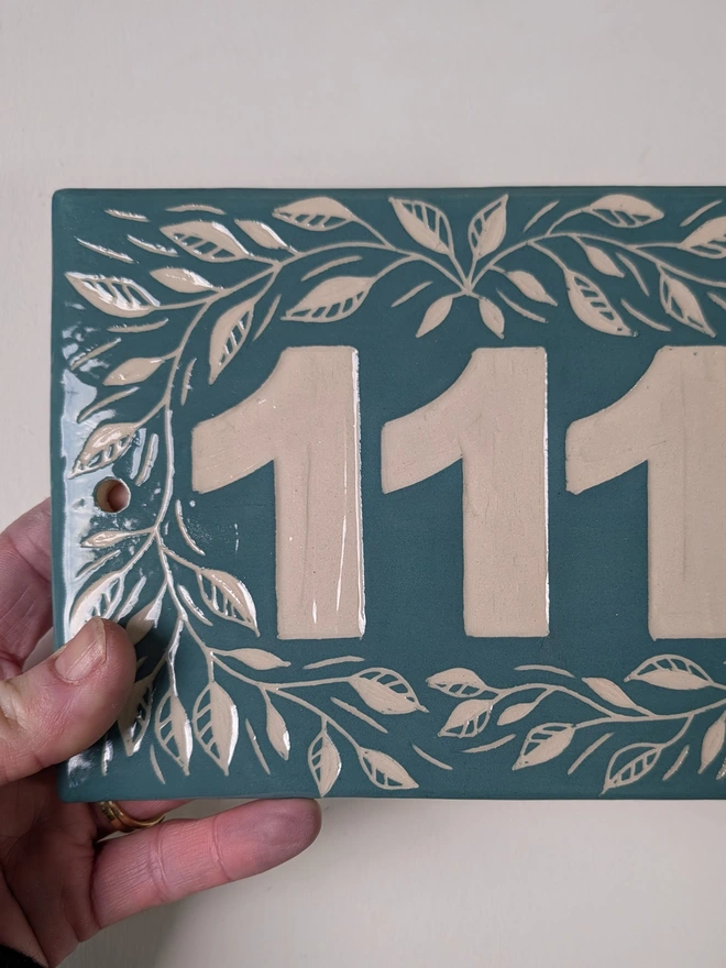 Personalised Ceramics House Number Leaf Tile. A Tile in Pine Green.