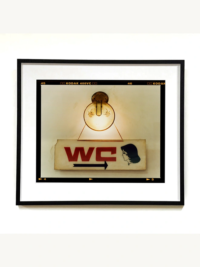 WC sign photograph framed in black