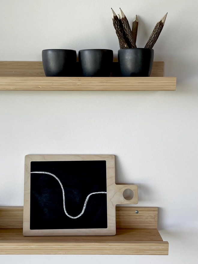 tablo on the shelf with decorative items