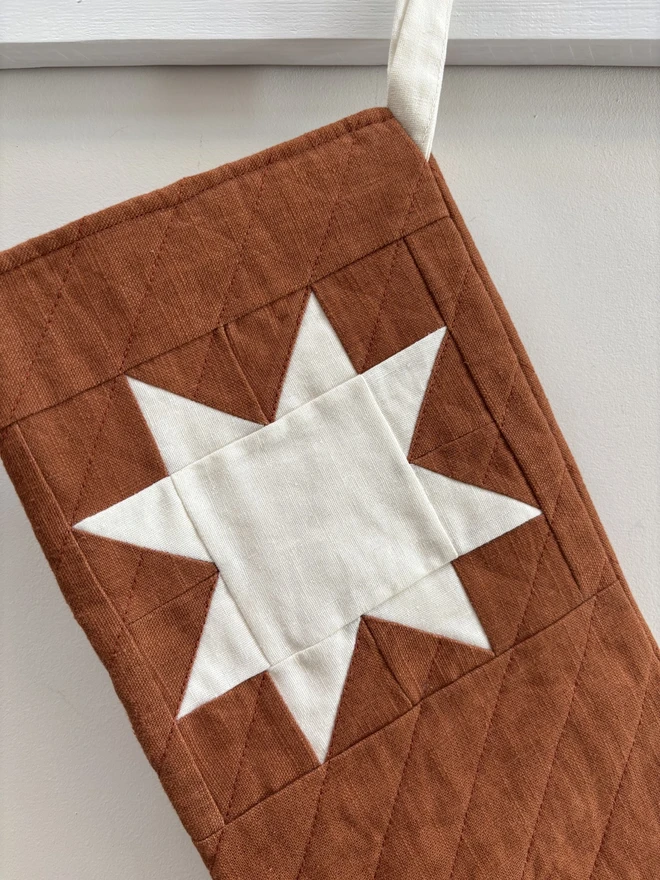 Ivory Linen Star Detail on Rust Linen Quilted Christmas Stocking.