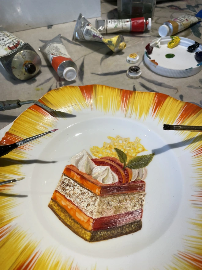 painting cake in the studio
