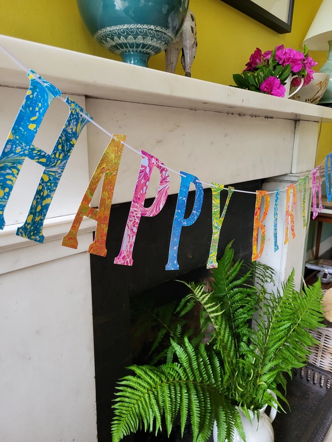 Hand-marbled happy birthday garland
