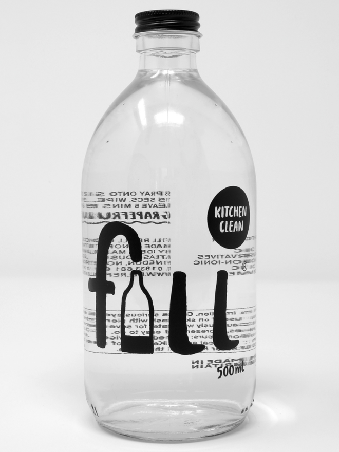 Kitchen Clean. A clear bottle labelled Fill Kitchen Clean.