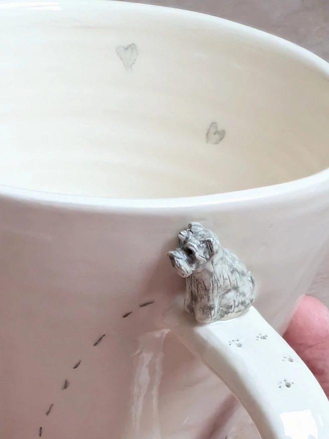 grey schnauzer cup with mini dog on mug handle with pawprints and hearts