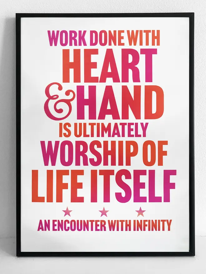 Framed print with pink and red text - Work done with heart and hand is ultimately worship of life itself - an encounter with infinity