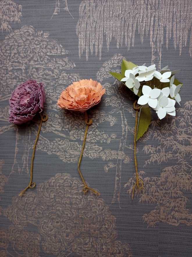 handmade paper flowers of a peony, ranunculus and hydrangea