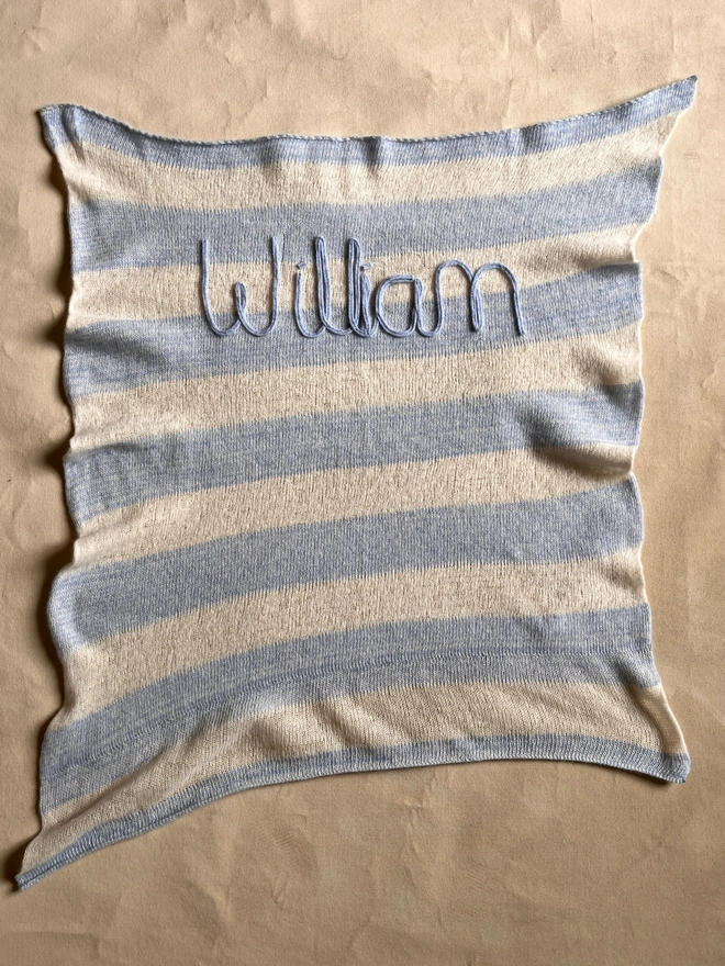Baby name William embroidered onto blanket made by Kitty