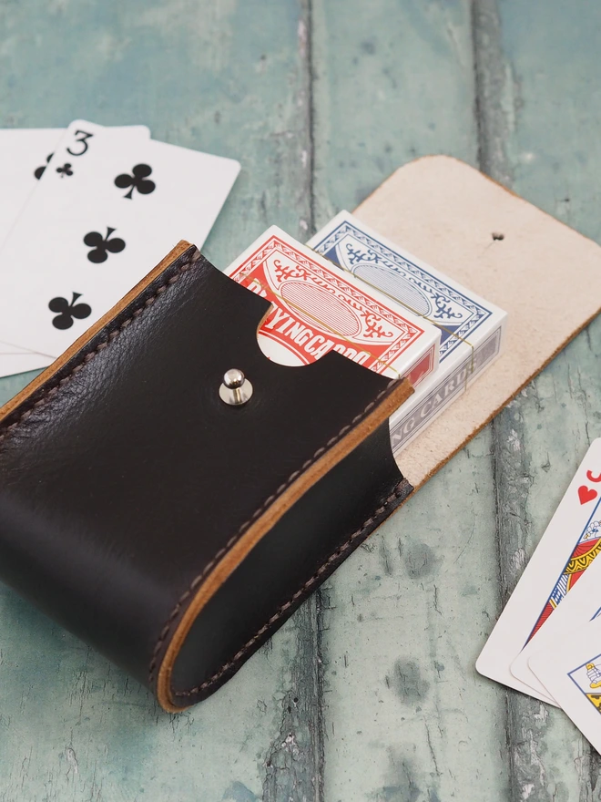 Personalised Leather Double Deck Playing Card Holder. Dark brown leather playing card case with two packs of cards inside.