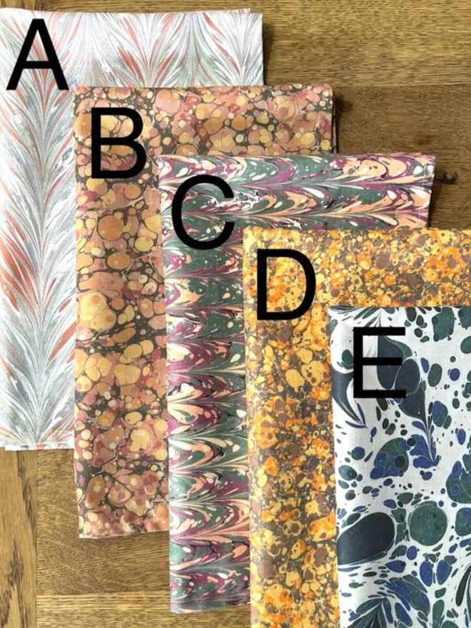 Tea Towels. A selection of towels in different patterns. The patterns are labelled.