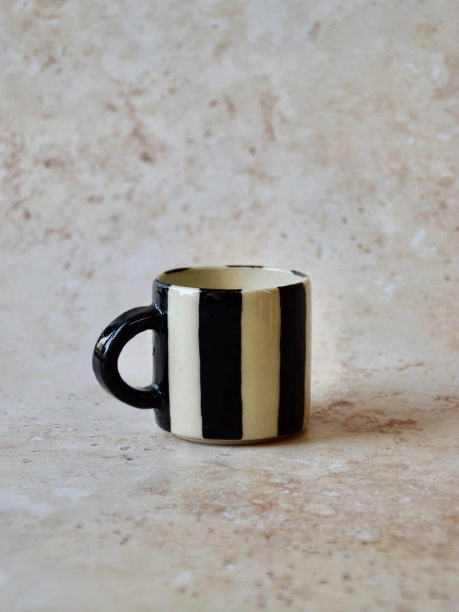 Le Petit Rayé handmade espresso cup side view - black and cream stripe pattern