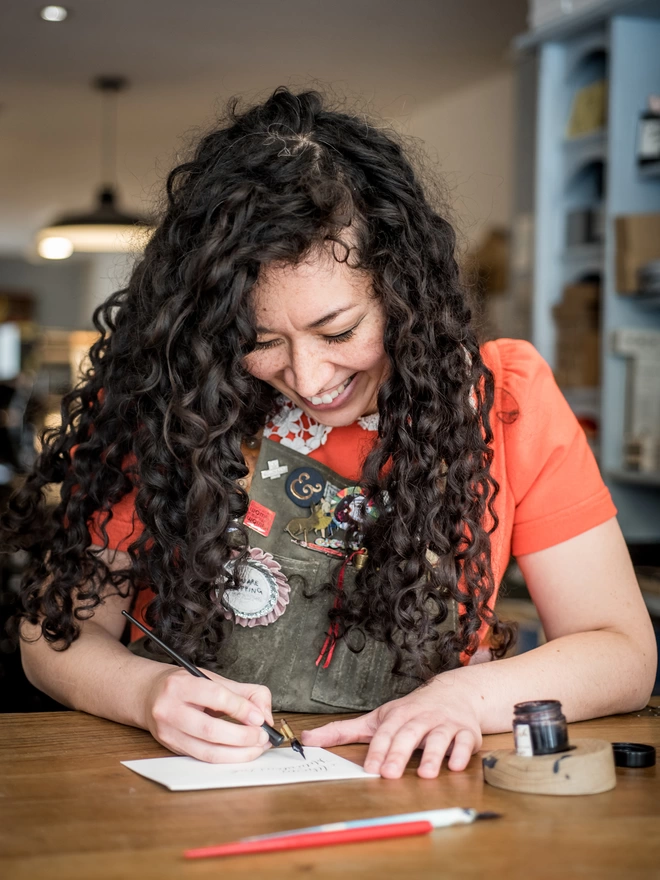 Athena doing calligraphy