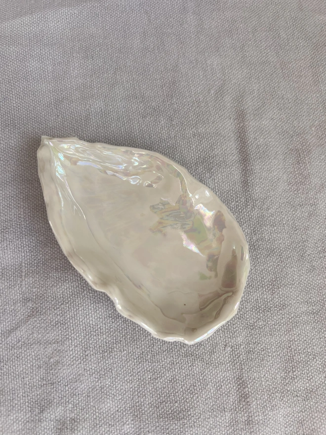 large porcelain oyster shell dish with mother of pearl lustre