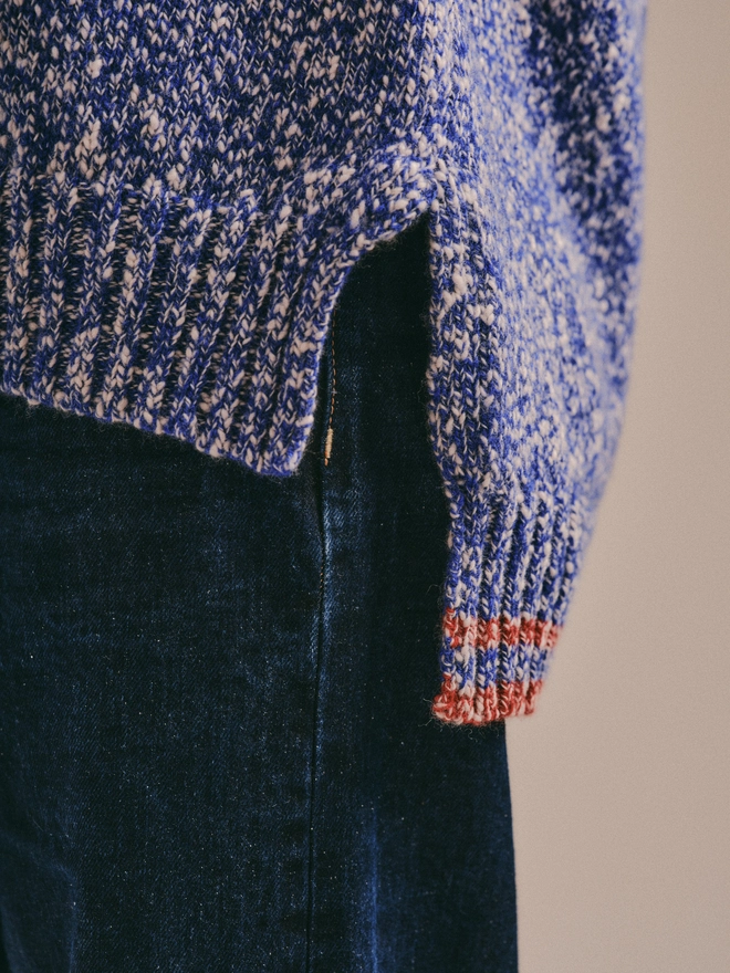 Blue knitted jumper detail