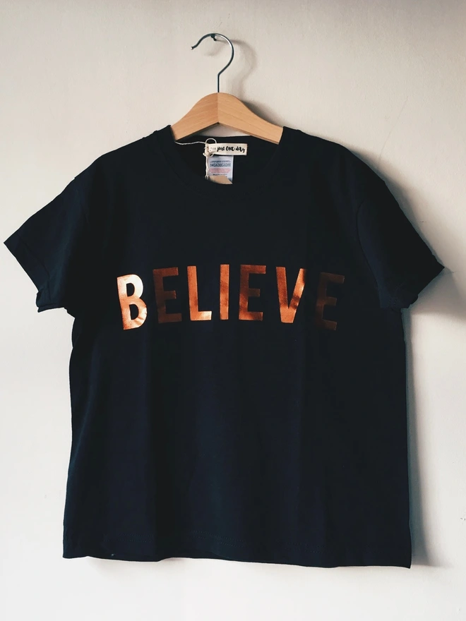 Black T-shirt with copper believe print on the chest