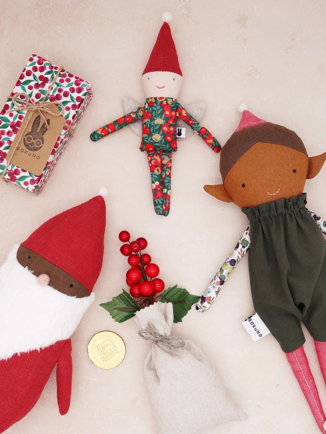 christmas fairy doll in liberty print and brown skin elf doll and dark skin santa doll