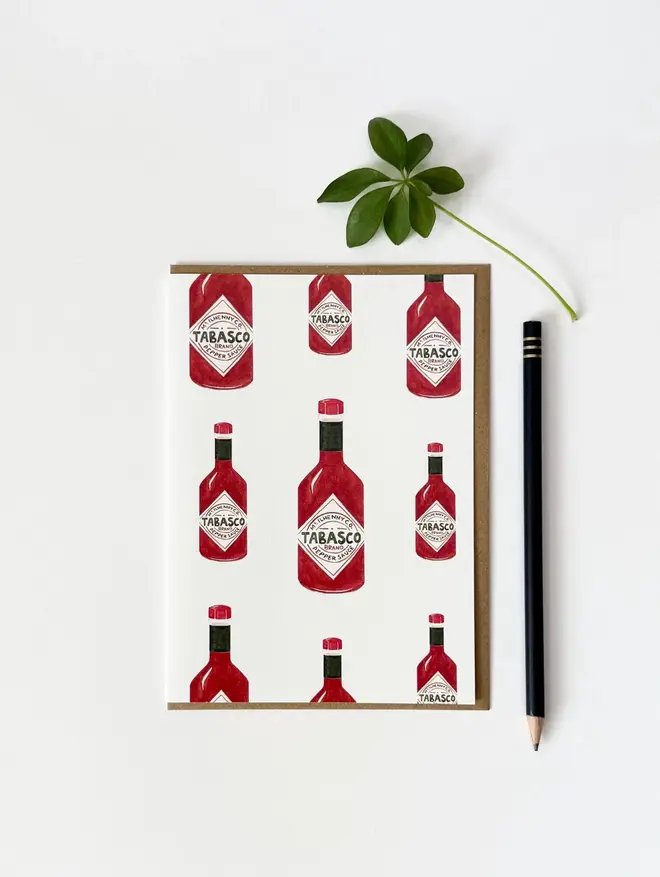 tabasco bottles illustrated card. card. photographed on plain white backgroundd.