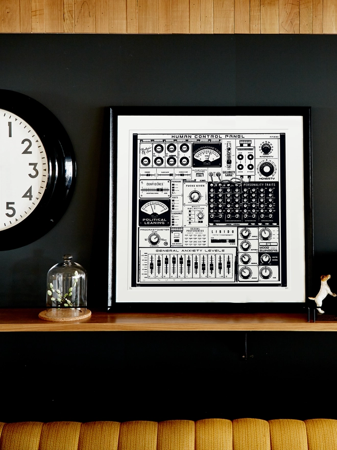 control panel art print on a shelf