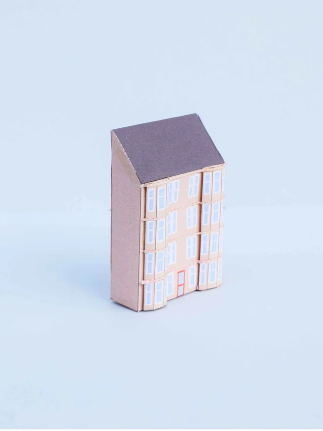 A paper tenement in blonde sandstone colour