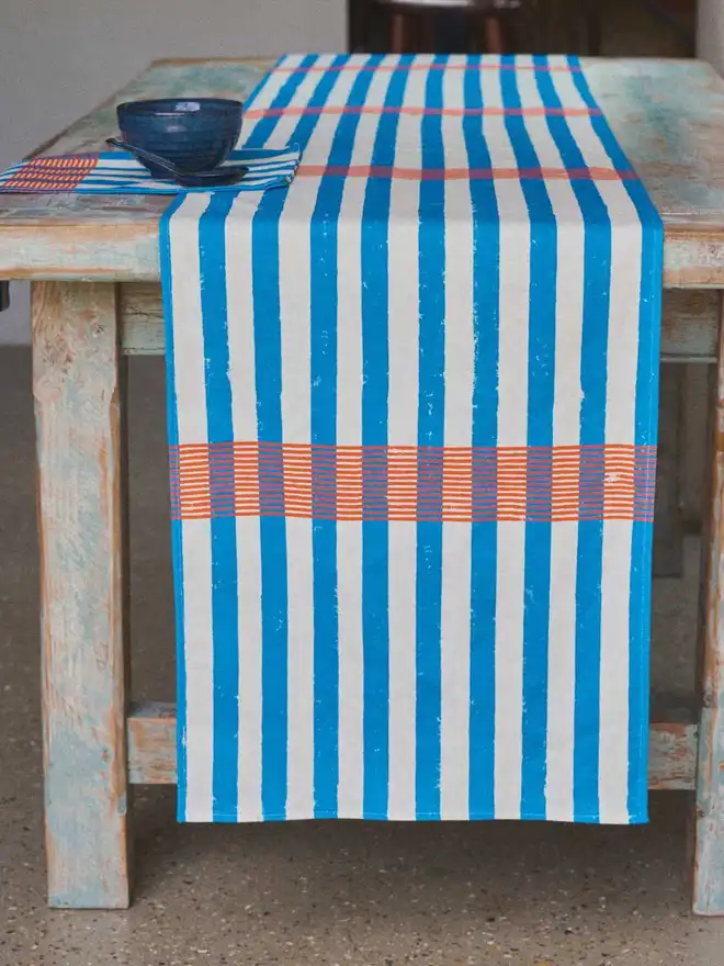  Blue and orange stripe table runner and napkin