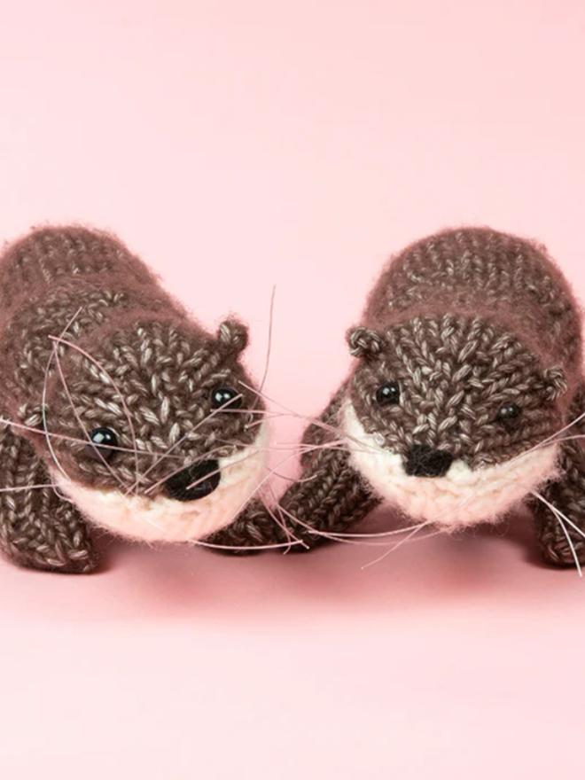 Pair of Otters Knit Kit. A knitted pair of otters.