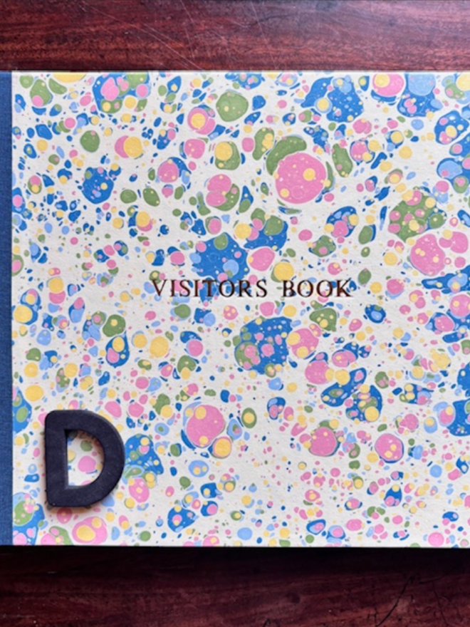 Visitor’s Book. A visitor’s book in D